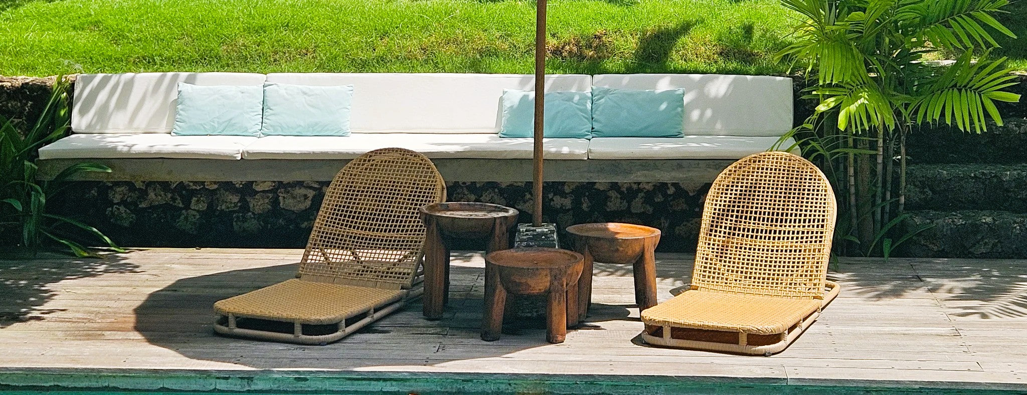 Outdoor furniture crafted from natural materials, showcasing the timeless beauty, durability and craftsmanship behind authentic handmade interiors and exteriors.